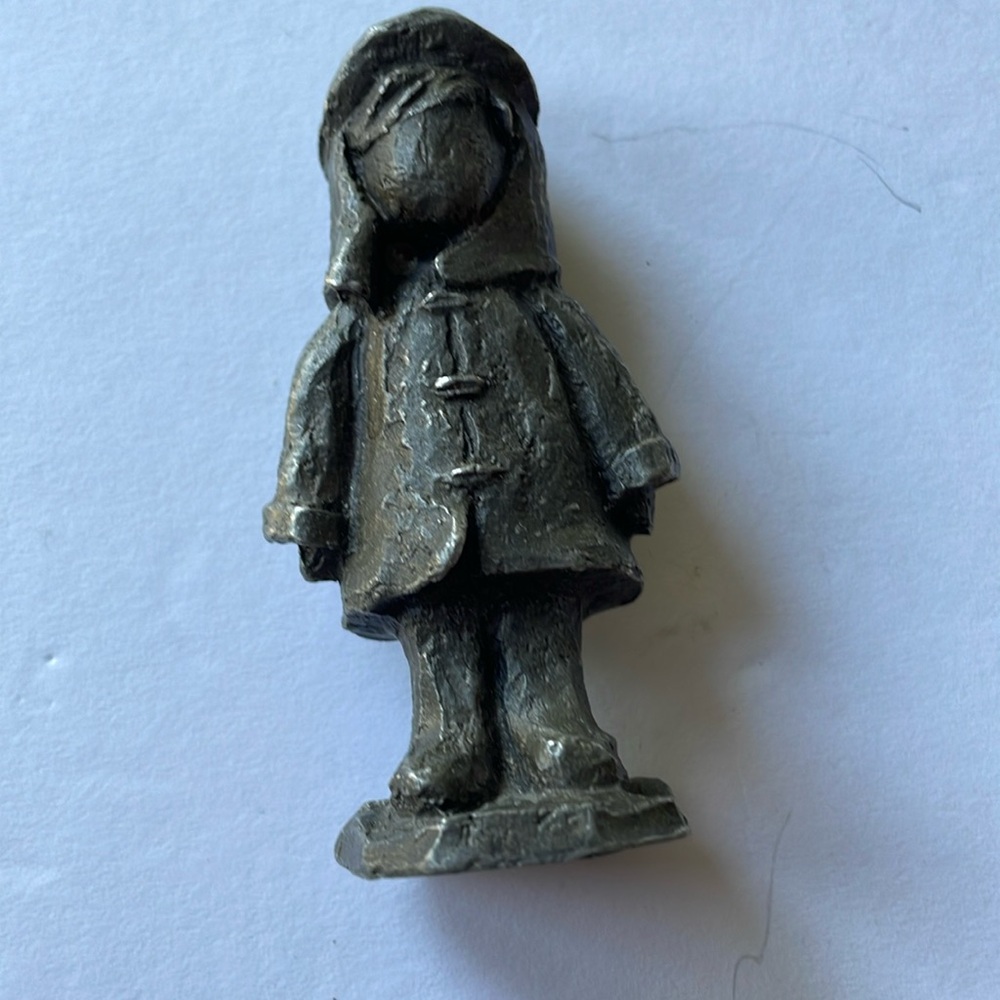 Hudson pewter boy figurine in raincoat
